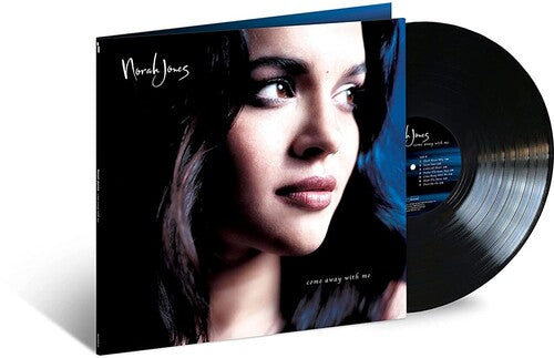 Vinyl record with a cover featuring a close-up of a person's face, with 'Norah Jones' on it.