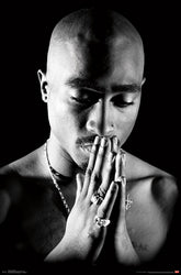 Tupac
Praying
Regular Poster
Size: 23x35

Black and white image of a person with hands pressed together in a prayer position.